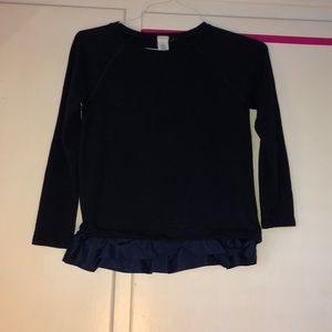 Navy sweater with ruffle at Bottom